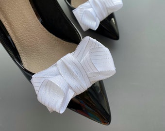 Stylish White Shoe Clips for Bridal Shoe Enhancement and Wedding Accessories.