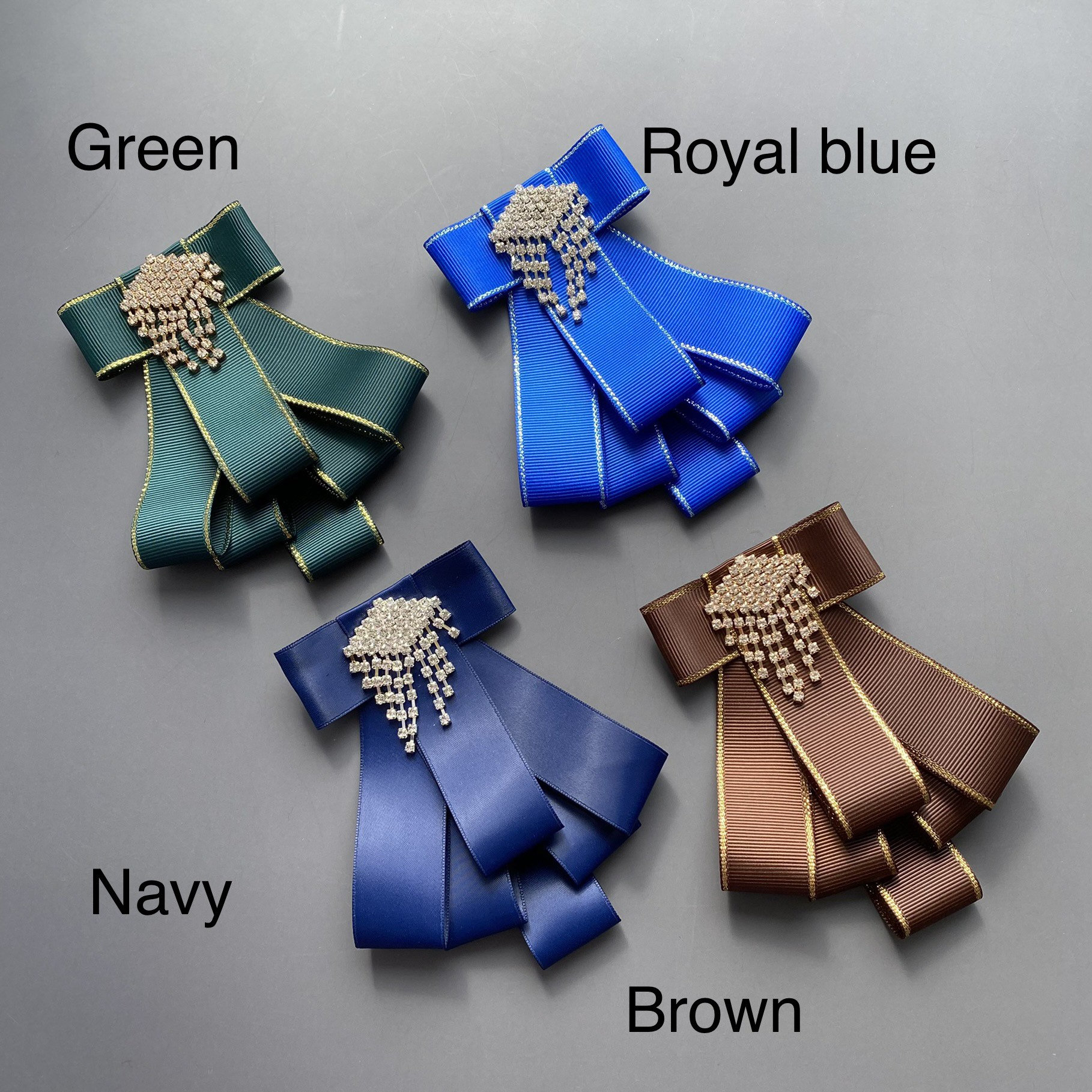 Brooch of White Satin Ribbon Bow With Rhinestone Center