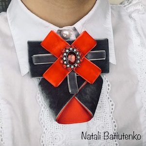 Grey, red Bow tie with rhinestone button.
