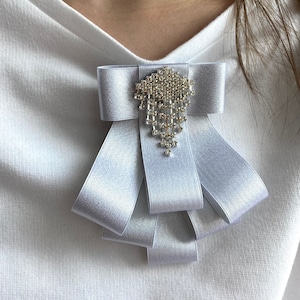Brooch of white satin ribbon bow with rhinestone center. Gift for her. Women Handmade Brooch.