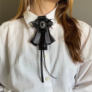 Black-white bow tie brooch for women. Gift for her. Handmade textile brooch.