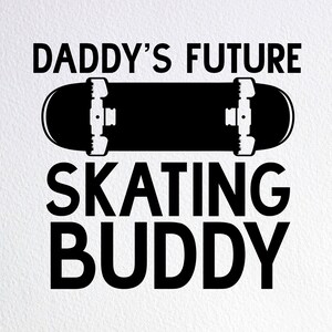 May include: Black and white graphic design with the text "Daddy's Future Skating Buddy" and a silhouette of a skateboard.