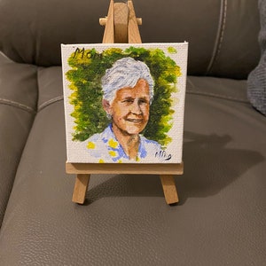 Mini hand painted portrait on mini canvas mounted on a mini wooden easel. Person or pet painted to order from your photographs!