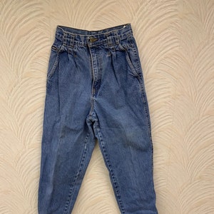 Vintage chique jaren 80 taps toelopende jeans met hoge taille