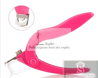 Pink or black guillotine clamp for capsules