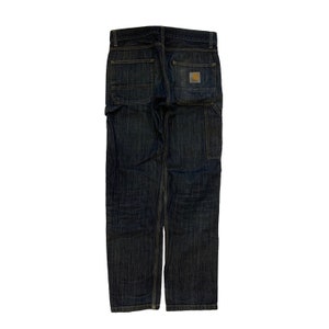 Vintage Carhartt Dungaree Fit pantalones desgastados trabajo carpintero sola rodilla resistente ropa de trabajo utilidad baggy descolorido azul oscuro índigo denim jeans