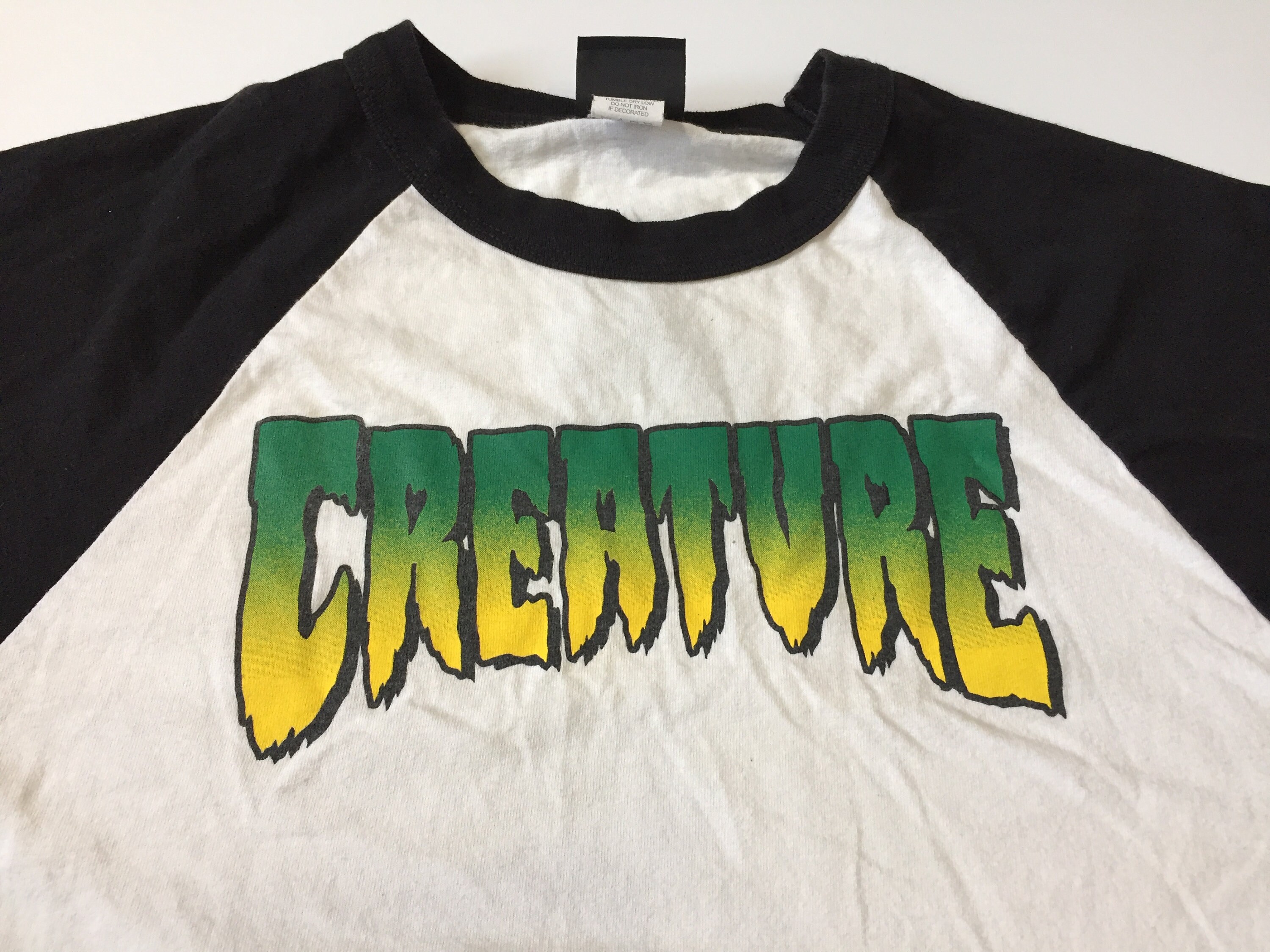 Creature Web Black & Green Ringer T-Shirt