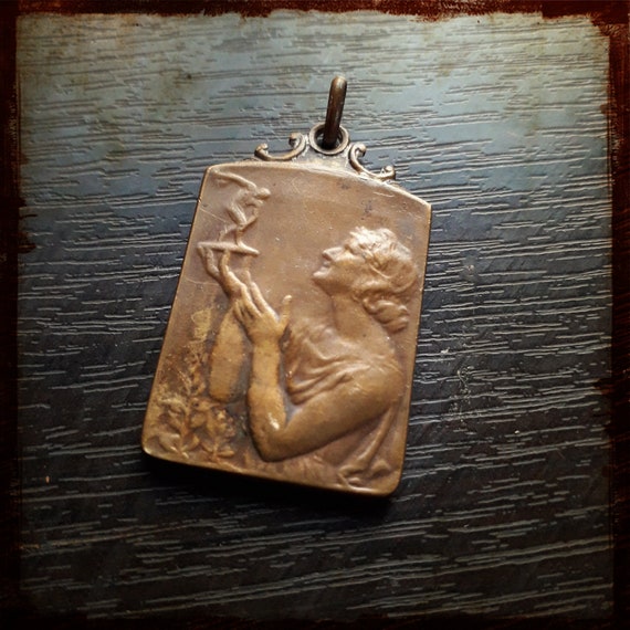Antique Sport Athletic Medal dated 1926 with a woman … Gem