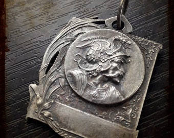 Antique French Silver Art medal signed Charles Brennus depicting his Gallic namesake - Victory symbol Art nouveau pendant around 1900 1910