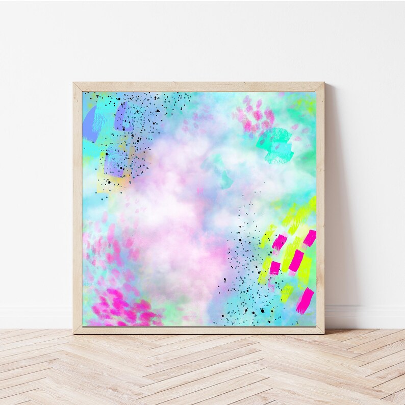 May include: Abstract art print with a watercolor background in shades of blue, pink, and green. The background is covered in black speckles and bright pink, yellow, and green brushstrokes.