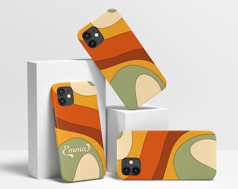 May include: Three phone cases with a retro abstract design featuring wavy lines in shades of orange, yellow, green, and brown. One case has the name "Emma" written on it.