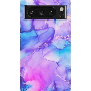 May include: A phone case with a vibrant abstract design. The case features a blend of blue, purple, and pink hues, with gold accents. The design resembles flowing ink or watercolor, creating a dynamic and artistic look. The case has a camera cutout.