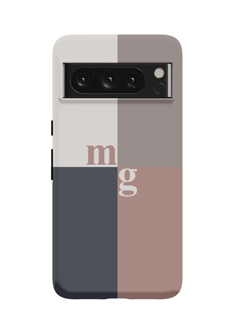 May include: A phone case with a geometric design in shades of gray, white, and pink. The case has a camera cutout and the letters "mg" printed on it.