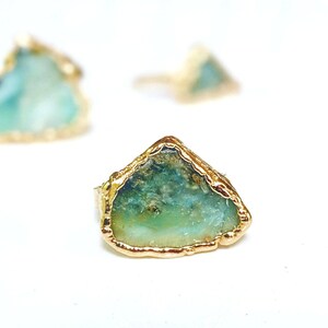 A set of 3 raw Peruvian Opal rings set in 18k Gold