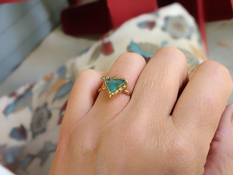 A set of 3 raw Peruvian Opal rings set in 18k Gold
