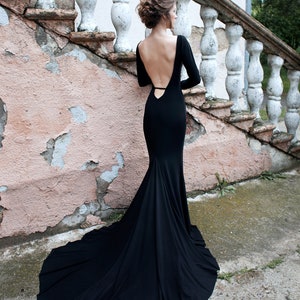 Evening and wedding minimalist simple dress, simple wedding dress with boat neck, open back, full sleeves, black sexy wedding dress image 1