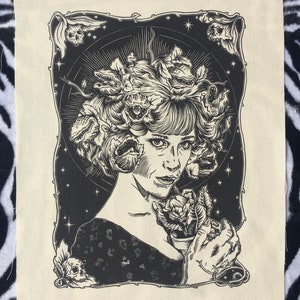 May include: Black and white illustration of a woman with a crown of carnivorous plants on her head. She is holding a small plant in her hand. The background is a dark starry sky.