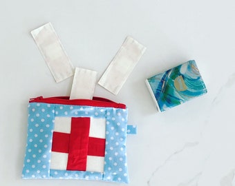 First aid zipper pouch bag travel holiday teen adult new parent gift pale light blue polka dot small handy mini bag for pads