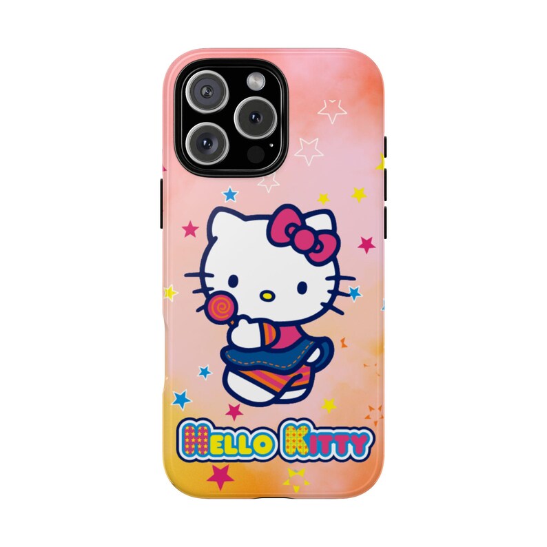 May include: A phone case featuring Hello Kitty. The case has a pink and orange gradient background with star accents. Hello Kitty is depicted holding a lollipop, wearing a pink bow and a blue skirt. The words "Hello Kitty" are at the bottom.