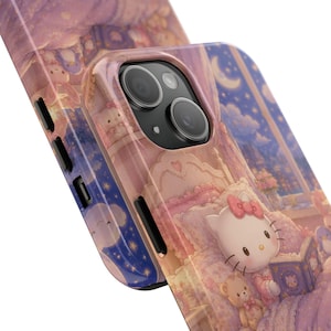 May include: A glossy phone case featuring a printed illustration of a white cat character with a pink bow reading a book in a bedroom. The scene includes a teddy bear, a crescent moon, and a starry night sky visible through a window in shades of pink.