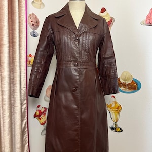 Vintage 70s | A Beauty Co. | Chocolate Brown Genuine Leather Dog Ear Notched Collar Leather Lightweight Spring Trench Midi Coat Pleat A Line