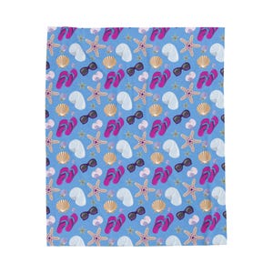 May include: A blue blanket with a repeating pattern of beach-themed elements. The design includes pink flip-flops, black sunglasses, white seashells, starfish, and golden seashells. The blanket is a summer-themed textile.