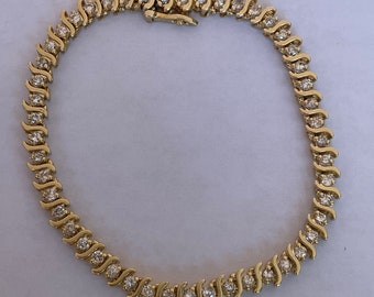 14K Yellow Gold S Link Tennis Bracelet 1.50 carats 9.20 DWT. 7'' long