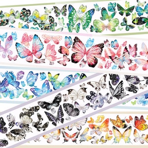 May include: A collection of decorative washi tapes featuring watercolor butterfly designs. The tapes showcase a variety of butterfly species in vibrant colors, including green, pink, blue, and orange. The tapes are arranged in horizontal strips.