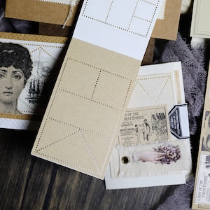 K&ouml;nnte beinhalten: Ein Satz brauner Papierkarten mit gepunkteten Linien um die R&auml;nder. Die Karten sind f&uuml;r die Verwendung als leere Etiketten oder Anh&auml;nger gedacht.