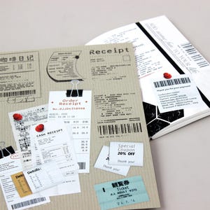 May include: A collection of receipts and coupons on a brown cardboard background. The receipts are for various items, including coffee, food, and tickets. The coupons offer discounts on various products and services. The text on the receipts and coupons is in Japanese and English.