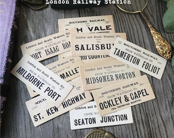 May include: Vintage train station ticket stubs with destinations like H Vale, Salisbury, Tamerton Foliot, Milborne Port, and St. Kew Highway. The tickets are printed on white paper with black ink and have a worn, aged look.