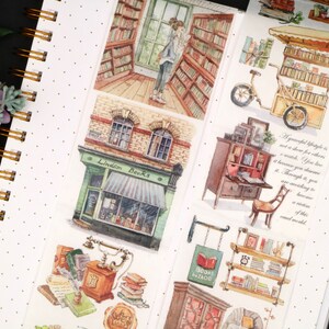 May include: A collection of vintage-style book-themed stickers. The stickers feature illustrations of bookshops, book carts, and bookshelves. The stickers are printed on white paper with a watercolor effect. The stickers are perfect for adding a touch of whimsy to your planner, journal, or scrapbook.