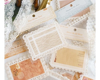 May include: A set of decorative paper stickers with lace borders. The stickers feature a variety of designs, including a floral pattern, a butterfly, and a text box. The stickers are perfect for adding a touch of vintage charm to your crafts and projects.