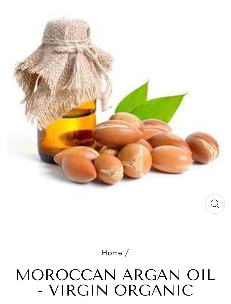 May include: A glass bottle of Moroccan argan oil with a burlap covering and a pile of argan nuts in front of it.