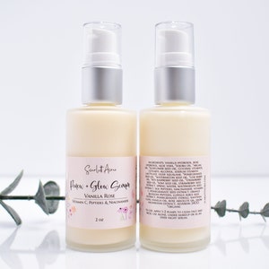 May include: Two 2-ounce bottles of a clear serum labeled "Renew + Glow Serum Vanilla Rose Vitamin C, Peptides & Niacinamide". The bottles have silver pumps and are on a white surface with a green plant in the background.