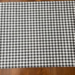 Classic Black and White Checked Rectangular Placemats, sold individually.