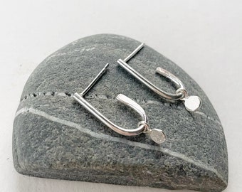 Silver hoop stud earrings with pebble charm