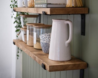 Rustic shelf hand crafted using reclaimed timber 22cm depth 3.3cm thickness. Industrial "down" style brackets