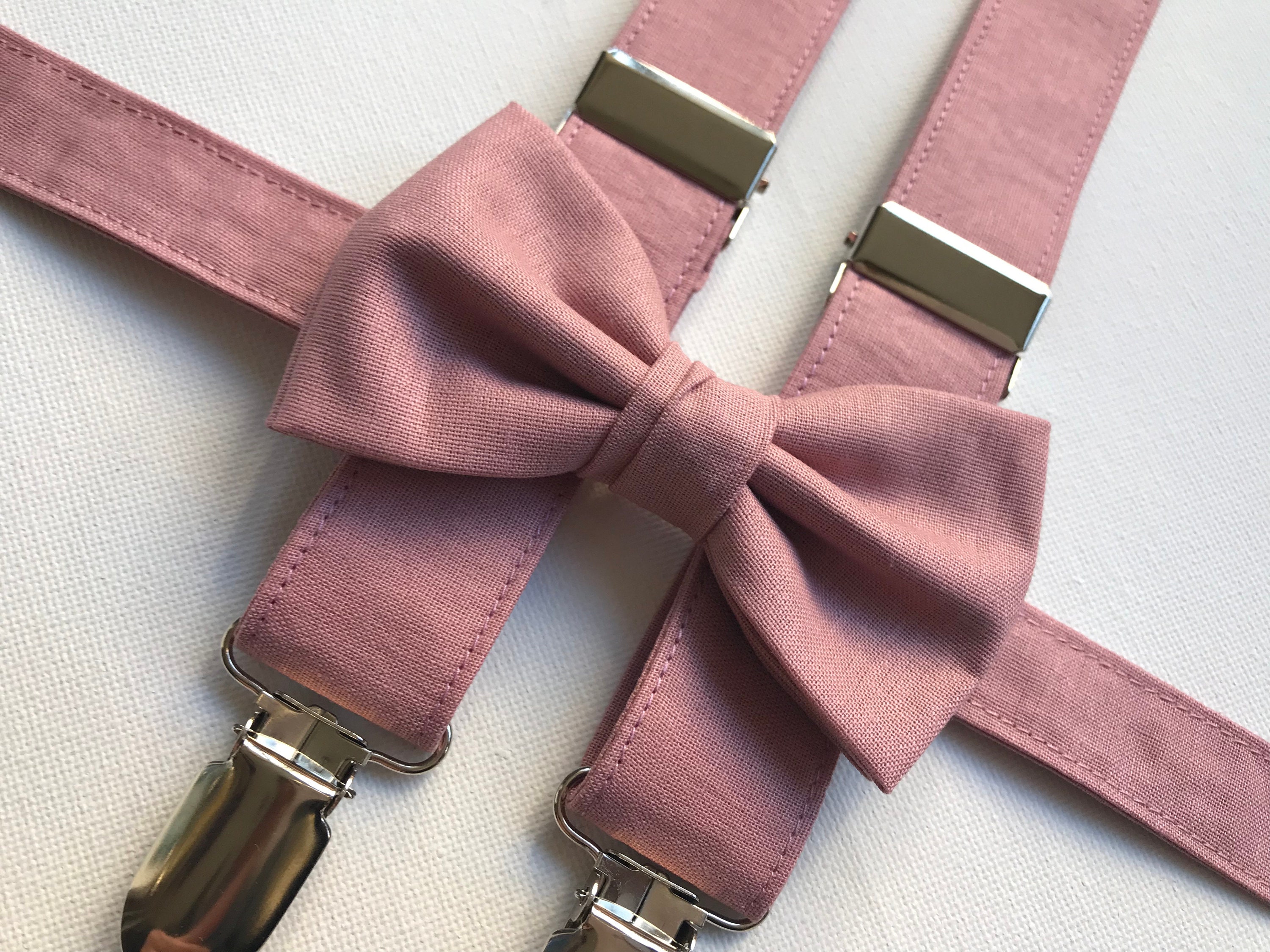 dusty pink bow tie and suspenders