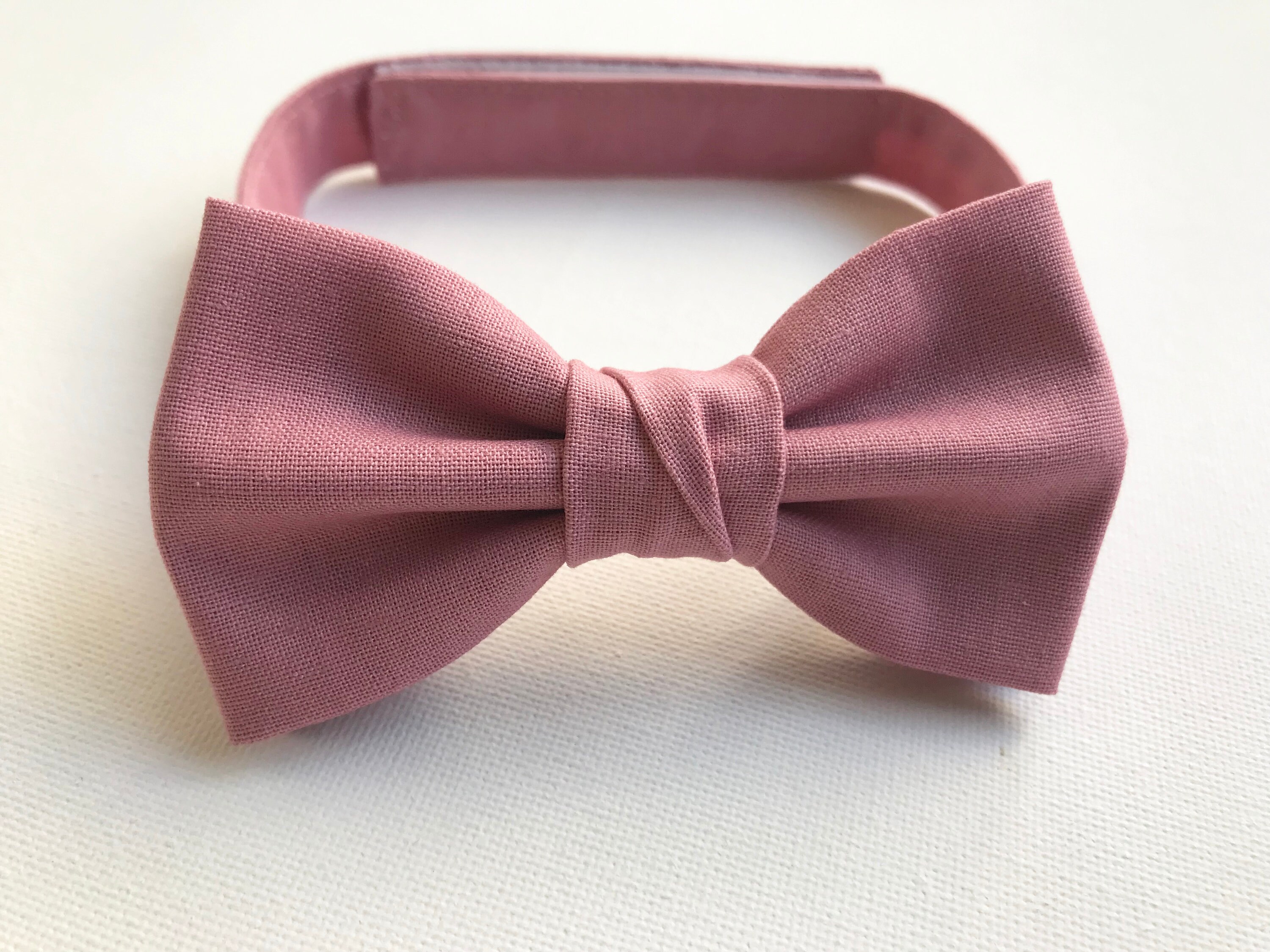 dusty rose tie and suspenders