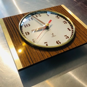Wall Clock, Mid-Century,Formica, Brass by Jaz circa 70’s