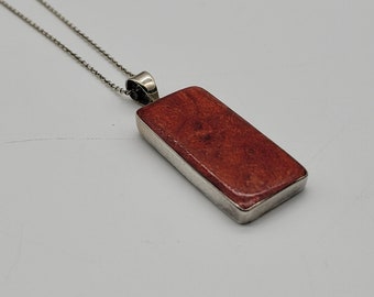 Collana con amuleto in corallo rosso e argento