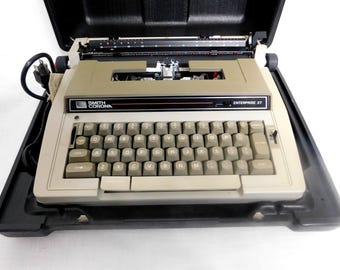 D8 - Smith Corona 80's Enterprize XT Electric Typewriter w/ Case