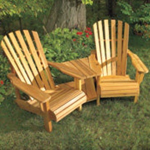 May include: Two wooden Adirondack chairs with a small table in between. The chairs and table are made of natural wood and have a rustic look.