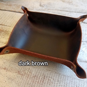 Dark brown tobacco tray.