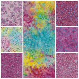 May include: A collection of nine fabric squares featuring a colourful, abstract pattern of circles and dots in shades of pink, blue, yellow, and green.
