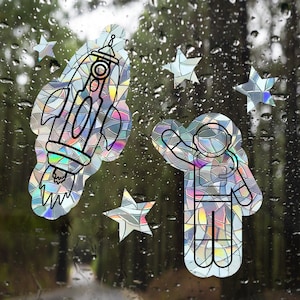 suncatcher-stickers voor ramen, ruimte-astronaut raket regenboogmaker sticker, regenboograam vastklevende regenboograam-suncatcher