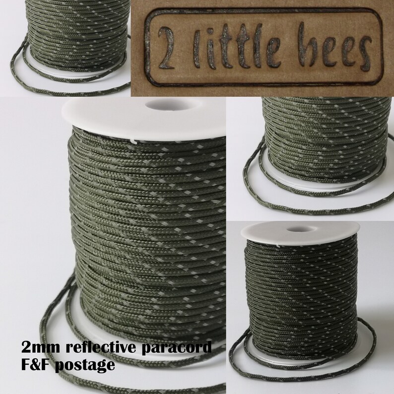 May include: A spool of 2mm reflective paracord in a green and white camouflage pattern. The spool is labeled "2 little bees" and "2mm reflective paracord F&F postage".