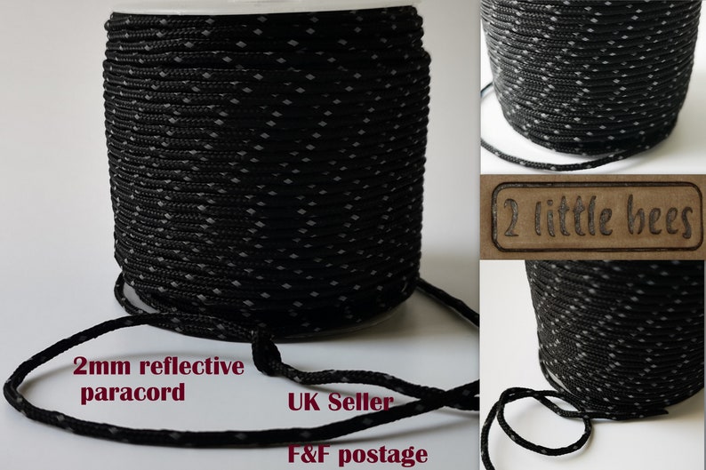 May include: A spool of 2mm black reflective paracord with white diamond-shaped reflective accents. The paracord is wound around a clear plastic spool. The text "2mm reflective paracord" and "UK Seller" is visible in the image.