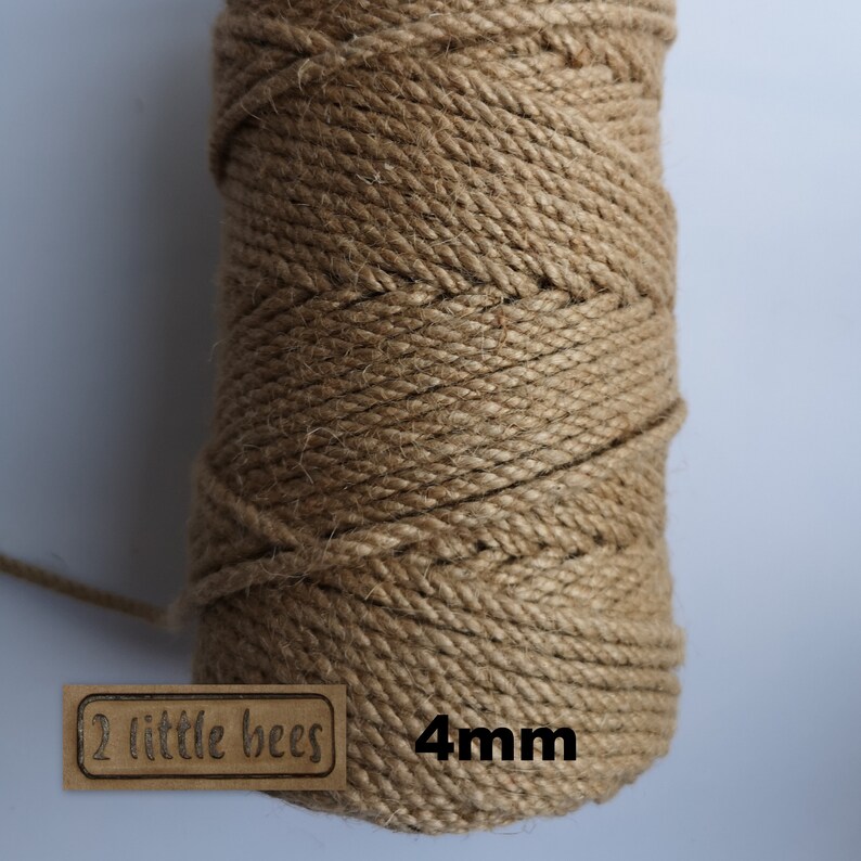 May include: A spool of natural brown jute twine, 4mm thick, with a label that reads "2 little bees".